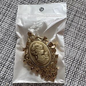 Elegant Gold Cameo Brooch